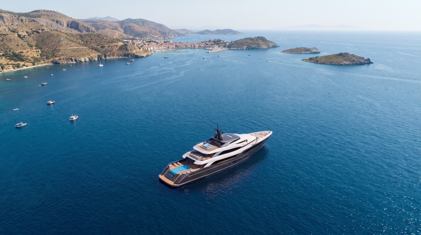 Wide aerial panorama of a yacht anchored in a Mediterranean bay